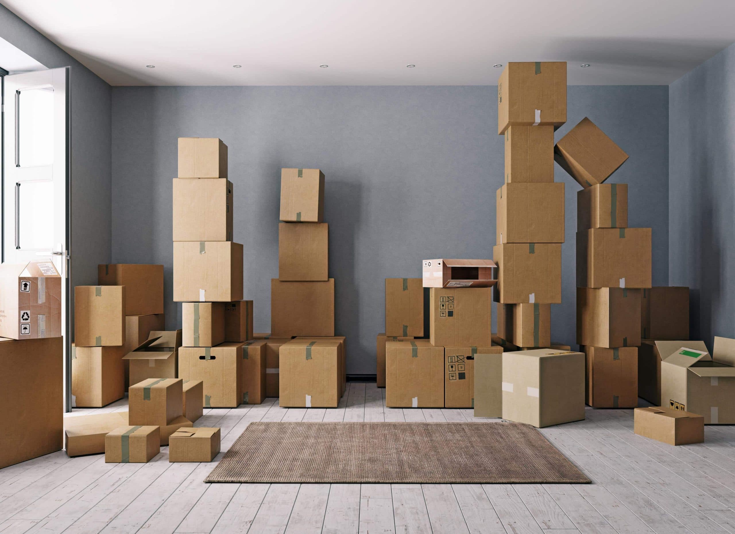 Moving boxes arranged inside a clean apartment